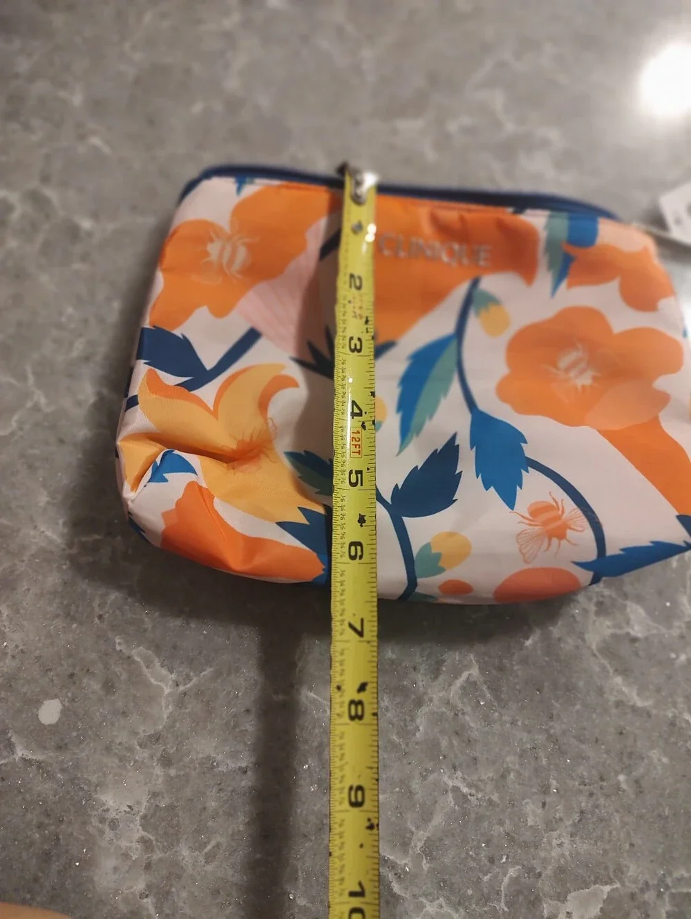 Clinique New with tags cosmetic bag pretty orange/blue